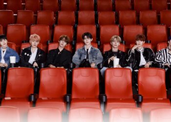 ZEROBASEONE sitting in a movie theater, comeback poster for "CINEMA PARADISE"